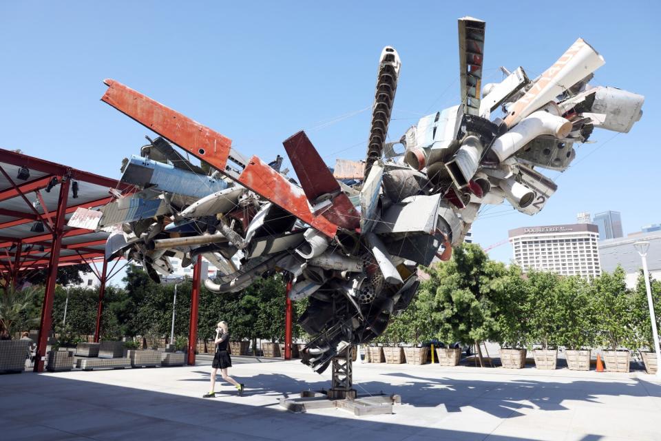 Nancy Rubin's tree-like sculpture made from airplane parts wired together is in front of the Geffen Contemporary at MOCA