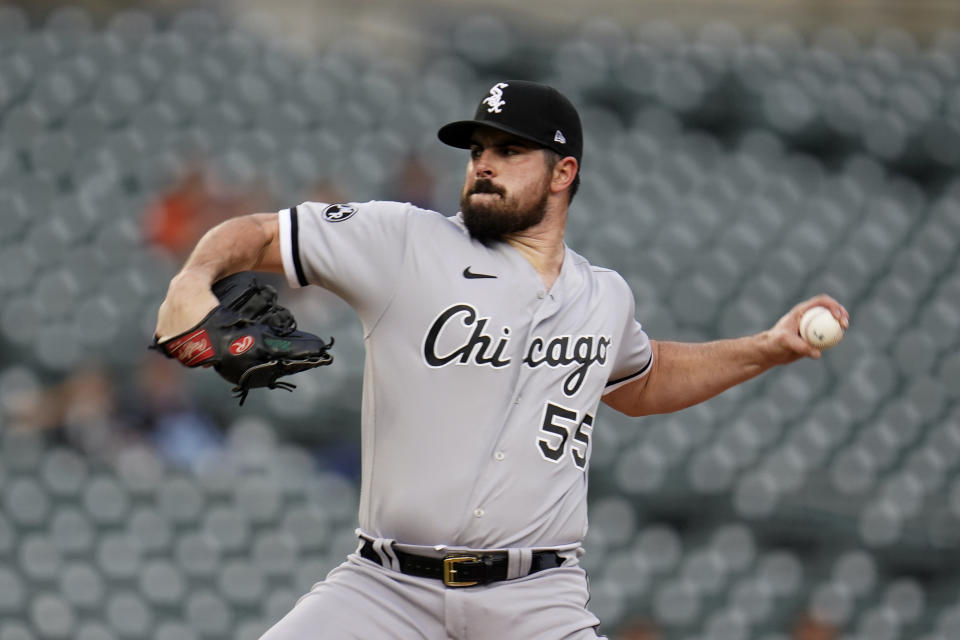 Chicago White Sox pitcher Carlos Rodon throws against the Detroit Tigers in the first inning of a baseball game in Detroit, Monday, Sept. 20, 2021. (AP Photo/Paul Sancya)