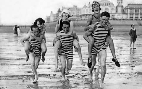 Tourists in 1938 enjoy the beach at Ostend. - Credit: AFP