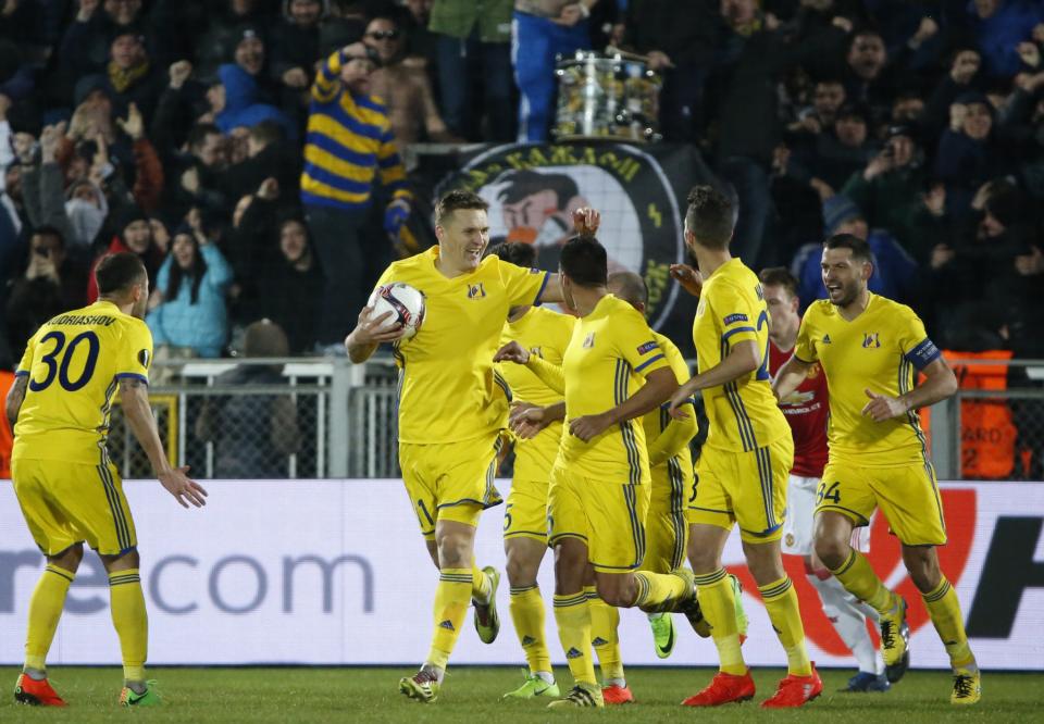 <p>Rostov celebrate their equaliser</p>