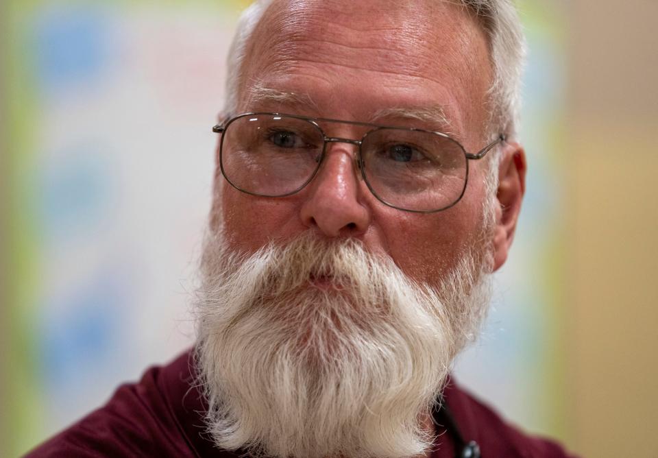 Archery coach Rick Simmons on Tuesday, Feb. 6, in the basement of Scecina Memorial High School.