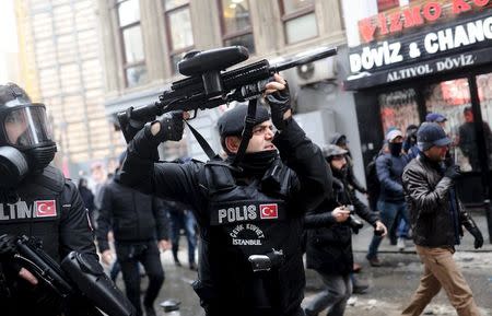 Turkish riot police use rubber pellets to disperse pro-Kurdish demonstrators during a protest against security operations in the Kurdish dominated southeast, in central Istanbul, Turkey January 3, 2016. REUTERS/Yagiz Karahan