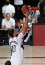 Portland Trail Blazers' Jusuf Nurkic (27) goes up to shoot against the Boston Celtics during an NBA basketball game Sunday, Aug. 2, 2020, in Lake Buena Vista, Fla. (Mike Ehrmann/Pool Photo via AP)