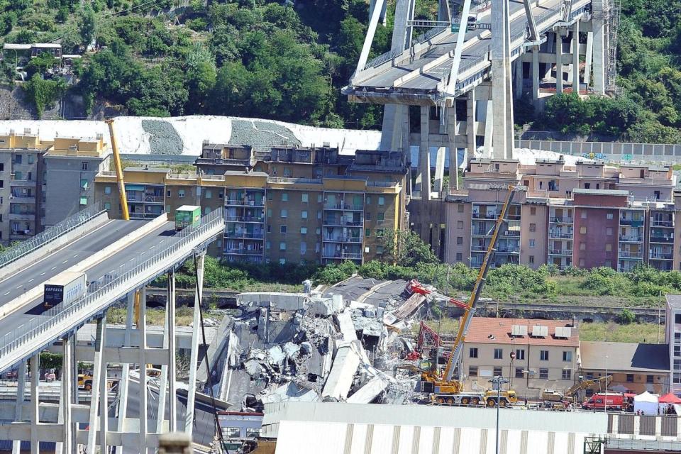 A general view of the collapsed Morandi bridge the day after the disaster in Genoa (EPA)