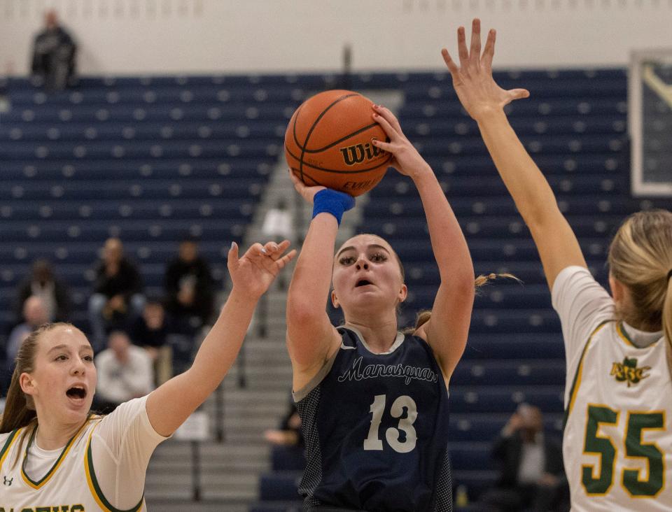 Manasquan Hope Masonius goes up with first half shot. Red Bank Catholic Girls Basketball vs Manasquan in Shore Conference Semifinal game in Toms River NJ on February 15, 2023. 