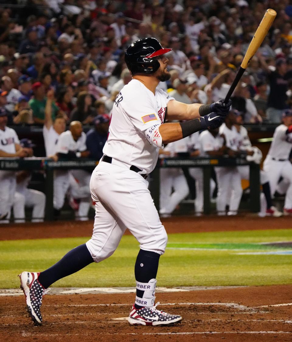 Kyle Schwarber hits a three-run home run against Great Britain.