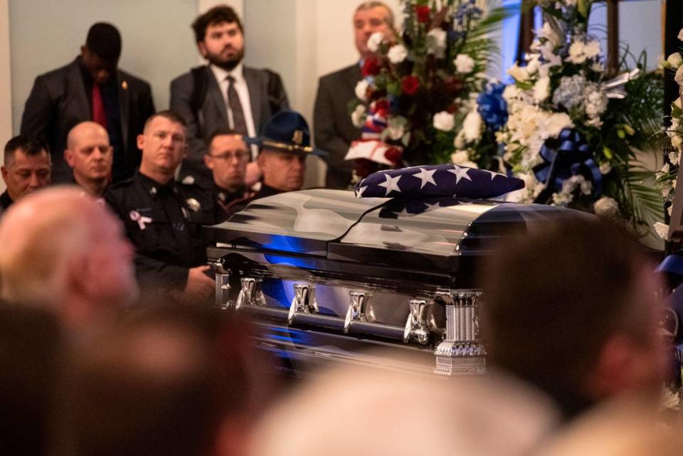 The casket of Steven Robin during the funeral of Bay St. Louis police officers Sgt. Steven Robin and Branden Estorffe at the Bay St. Louis Community Center in Bay St. Louis on Wednesday, Dec. 21, 2022. Robin and Estorffe were killed responding to a call at a Motel 6 on Dec. 14.