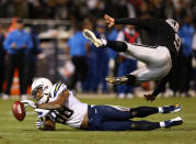 Dante Rosario #88 of the San Diego Chargers blocks a punt attempt by Shane Lechler #9 of the Oakland Raiders during their season opener at Oakland-Alameda County Coliseum on September 10, 2012 in Oakland, California. (Photo by Ezra Shaw/Getty Images)