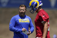 Los Angeles Rams head coach Sean McVay, left, talks to quarterback Matthew Stafford during an NFL football practice Tuesday, June 8, 2021, in Thousand Oaks, Calif. (AP Photo/Mark J. Terrill)