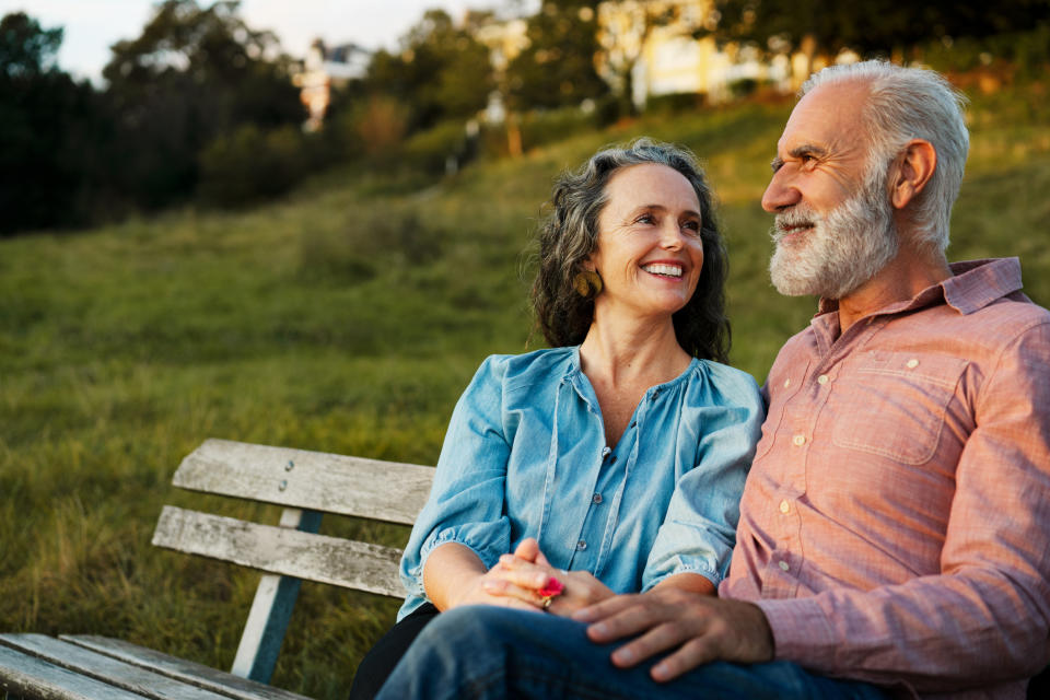 older couple sitting on a bench