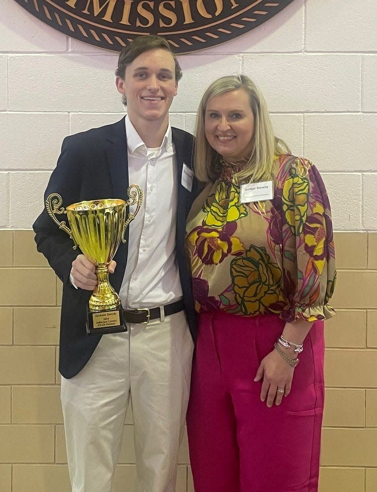 TJA and Jefferson County's overall STAR Student Jackson Dowdy poses his with his mother and STAR Teacher Amber Dowdy.