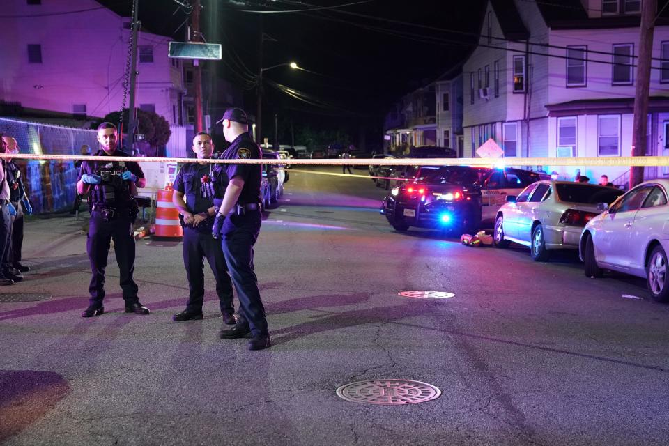 Paterson Police officers and Passaic County Sheriff's officers at the scene where two people were shot - one fatally - on Belle Avenue near Hopper Street in Paterson, NJ around 1:45 a.m. on September 18, 2022. (Photo/Christopher Sadowski)