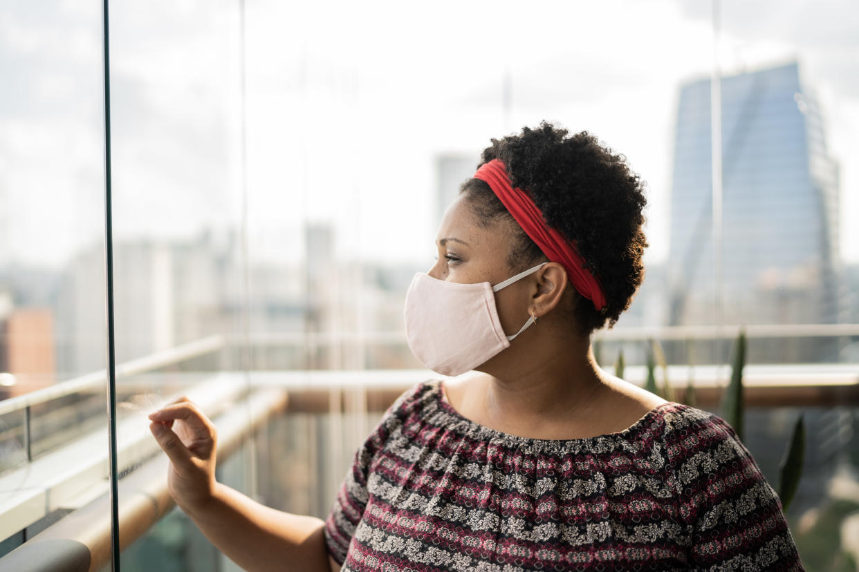 It's hard to shake the fear and anxiety that come with the coronavirus pandemic, even after you've been fully vaccinated. Here's how to reacclimate to the world, according to experts. (Photo: FG Trade via Getty Images)