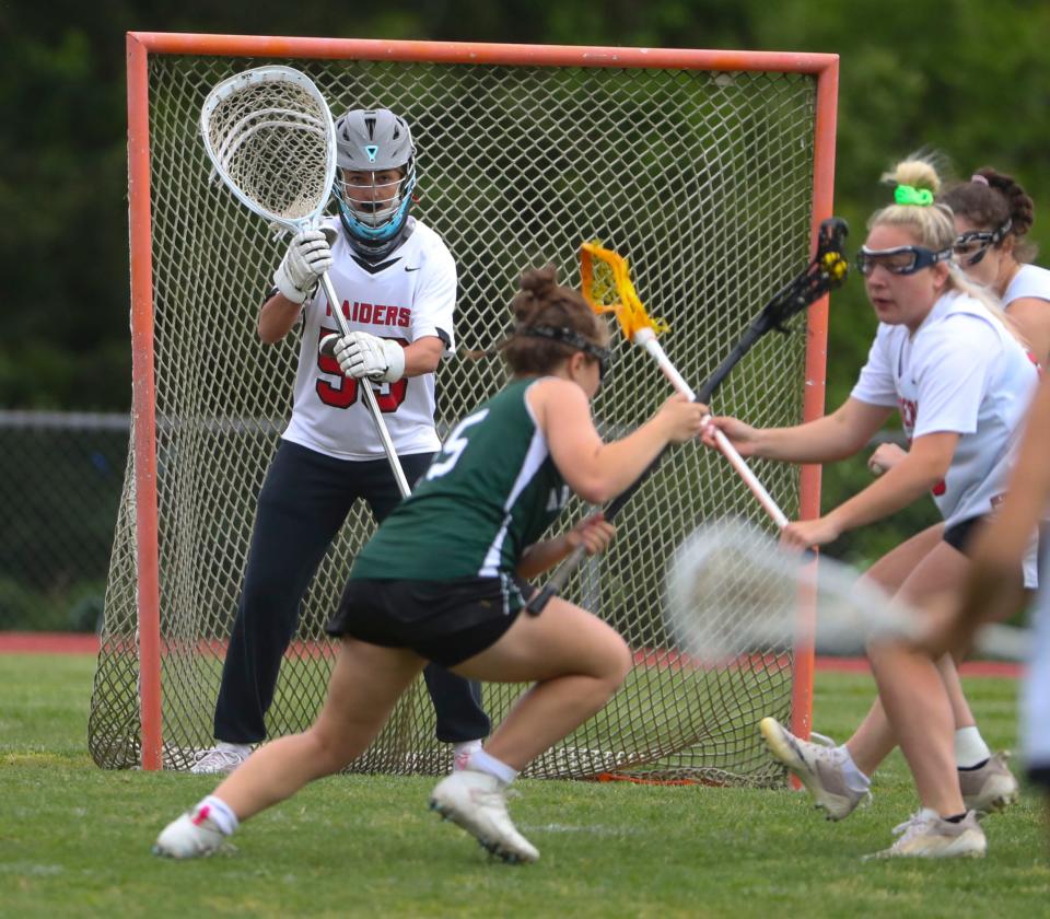 Ursuline keeper Amelia Cradler keeps ready in the Auks' 13-11 win in a visit to Serviam Field, Friday, May 5, 2023.