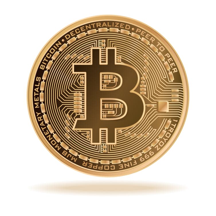 <span class="caption">Bitcoin was the first application of a blockchain, but the technology shouldn’t stop there.</span> <span class="attribution"><a class="link " href="https://www.shutterstock.com/image-vector/bitcoin-physical-bit-coin-digital-currency-674460637?src=l37Sdn0-y_jQyrBkOhfGvA-1-2&studio=1" rel="nofollow noopener" target="_blank" data-ylk="slk:AnnaGarmatiy/Shutterstock;elm:context_link;itc:0;sec:content-canvas">AnnaGarmatiy/Shutterstock</a></span>