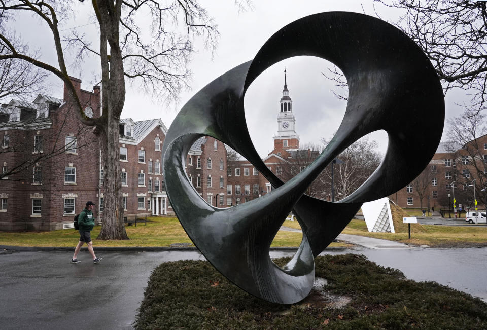 A student walks on the campus of Dartmouth College, Tuesday, March 5, 2024, in Hanover, N.H. Dartmouth's basketball players voted to form a union, an unprecedented step in the continued deterioration of the NCAA's amateur business model. (AP Photo/Robert F. Bukaty)