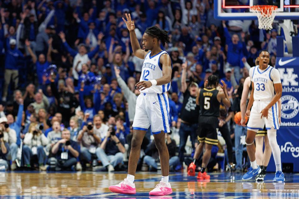 Mar 6, 2024; Lexington, Kentucky, USA; Kentucky Wildcats guard Antonio Reeves (12) celebrates after making a three point basket at the end of the first half against the Vanderbilt Commodores at Rupp Arena at Central Bank Center. Mandatory Credit: Jordan Prather-USA TODAY Sports