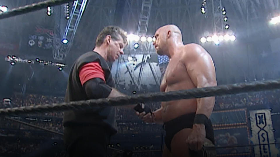 Mr. McMahon and Stone Cold Shaking Hands at Wrestlemania 17