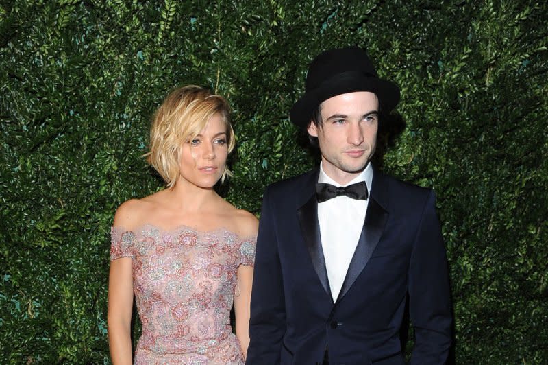 Tom Sturridge, seen with Sienna Miller, stars in "Widow Clicquot." File Photo by Paul Treadway/UPI