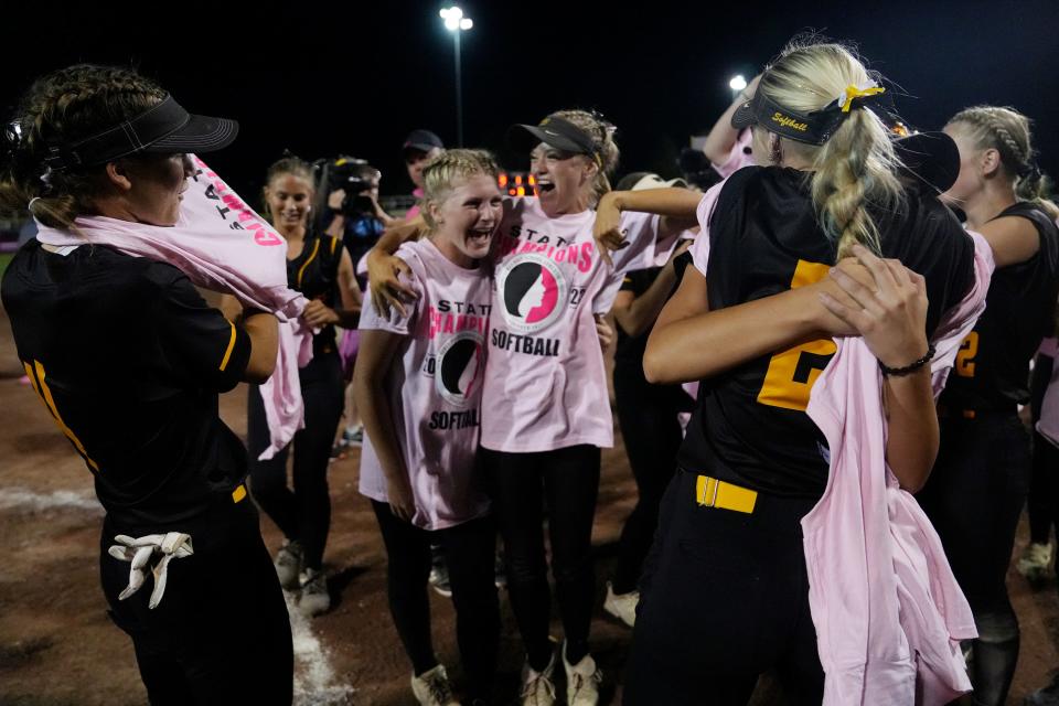 Winterset celebrates winning the Class 4A state softball championship over North Scott on Thursday in Fort Dodge.