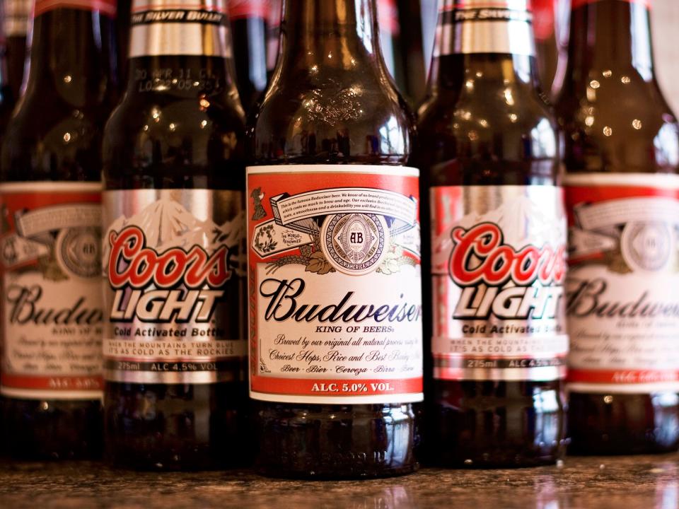 Bottles of Budweiser and Coors Light