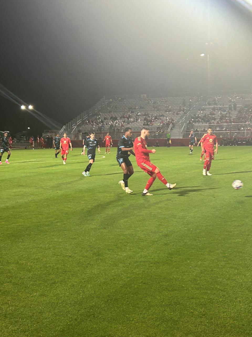 Phoenix Rising's Dariusz Formella maneuvers through Colorado's defense during Saturday's game at Phoenix Rising Stadium on April 13, 2024.