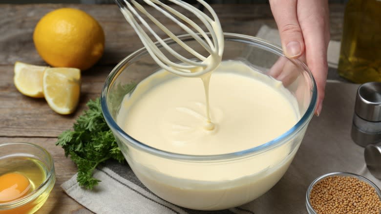 person making mayonniase