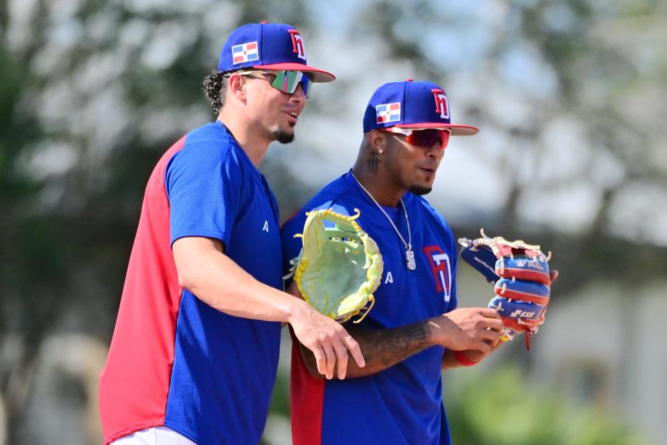 Brewers shortstop Willy Adames, left, was part of Team Dominican Republic during the World Baseball Classic.