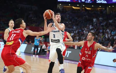Basketball - Slovenia v Serbia - European Championships EuroBasket 2017 Final - Istanbul, Turkey - September 17, 2017 - Goran Dragic of Slovenia and Vladimir Lucic and Stefan Jovic of Serbia in action. REUTERS/Osman Orsal