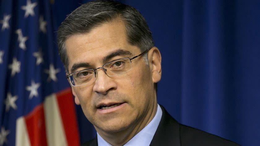 FILE - In this Jan. 24, 2018, file photo California Attorney General Xavier Becerra talks during a news conference in Sacramento, Calif. Becerra has filed a lawsuit against President Donald Trump's emergency declaration to fund a wall on the U.S.-Mexico border. Becerra released a statement Monday, Feb. 18, 2019, saying 16 states - including California - allege the Trump administration's action violates the Constitution. (AP Photo/Rich Pedroncelli, File)