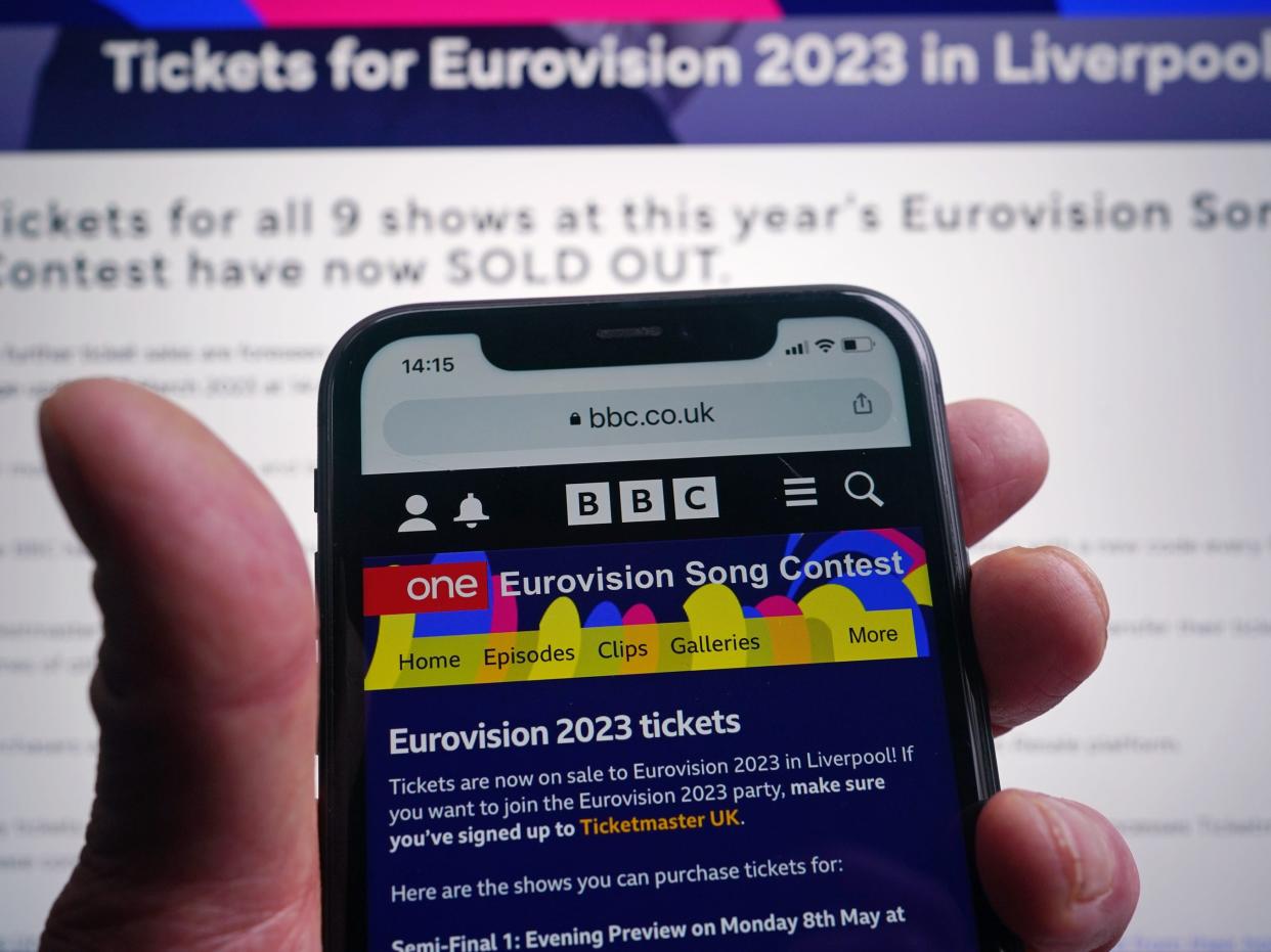 A view of the a phone screen displaying a Eurovision Song Contest tickets page and a page on the Eurovision website displayed on a laptop screen, informing those wishing to buy tickets that all nine shows are now sold out.
