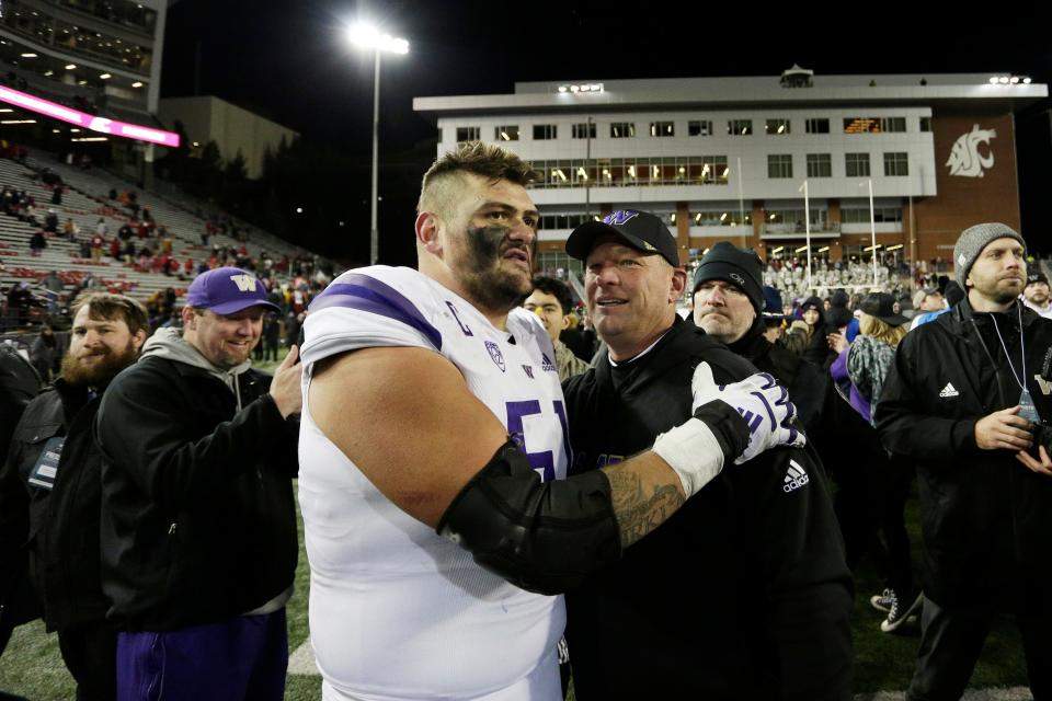 Washington head coach Kalen DeBoer, right, is a South Dakota native and former coach at the University of Sioux Falls. He leads the Huskies into the College Football Playoff against Texas on Jan. 1.