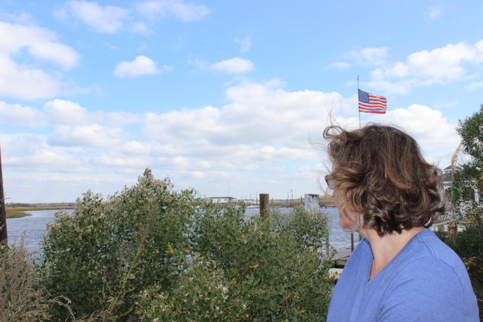 Meghan Wren looks out over the creek behind her home.&nbsp; (Photo: Alexander C. Kaufman/HuffPost)