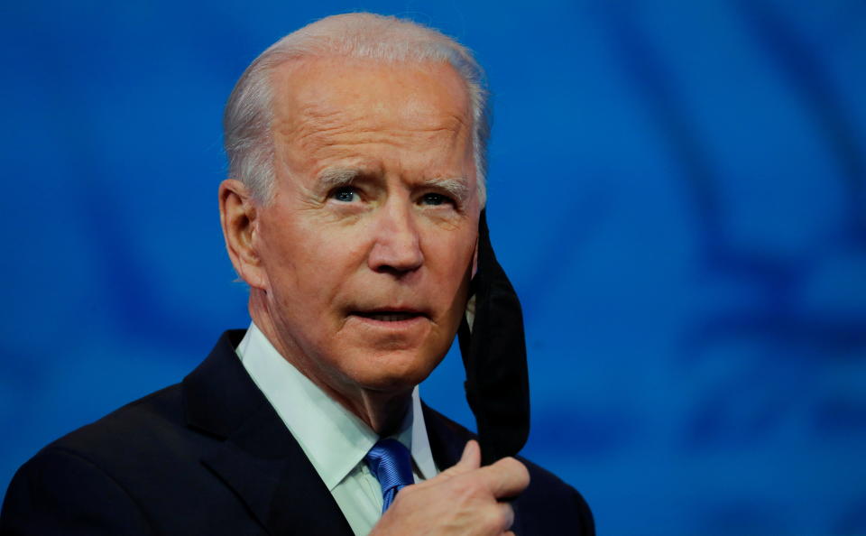 Biden delivered a blitz of executive actions on his first two days in office. (Photo: Mike Segar / Reuters)