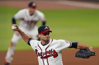 Atlanta Braves starting pitcher Charlie Morton works against a St. Louis Cardinals batter in the seventh inning of a baseball game Thursday, June 17, 2021, in Atlanta. (AP Photo/John Bazemore)