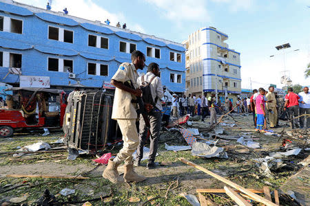 Somali security forces secure the scene after an explosion went off outside Weheliye Hotel in Maka al Mukarama street in Mogadishu, Somalia March 22, 2018 REUTERS/Feisal Omar
