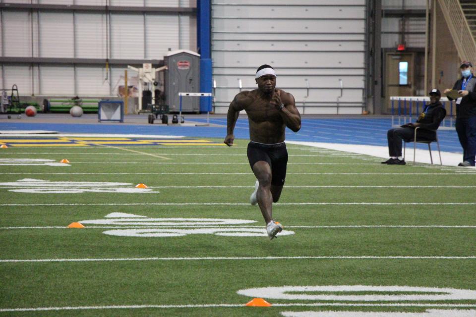 Vance Barnes of Northern State hits the home stretch of his 40-yard dash during South Dakota State football Pro Day on Wednesday at the SJAC in Brookings.