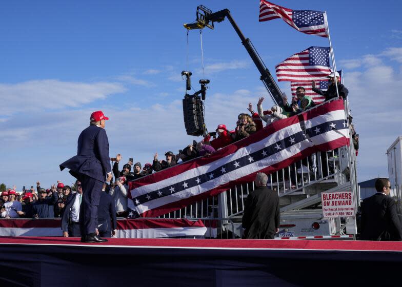 Republican presidential candidate and former President Donald Trump gestures to the crowd following a campaign rally Saturday, March 16, 2024, in Vandalia, Ohio. (AP Photo/Jeff Dean)