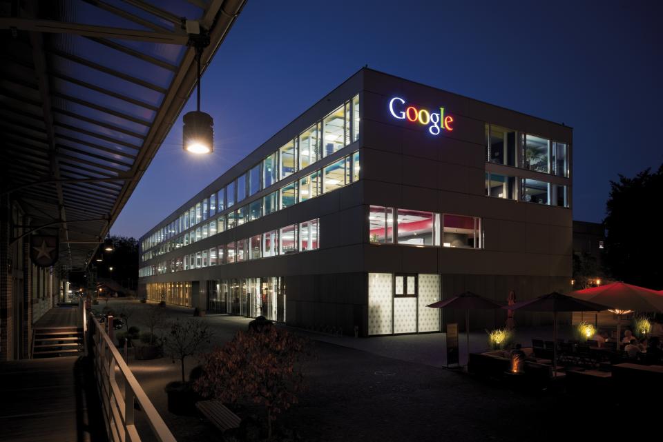 Building with the Google logo at night