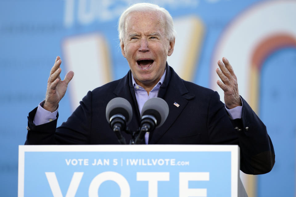 President-elect Joe Biden speaks in Atlanta, Monday, Jan. 4, 2021, as he campaigns for Senate candidates Raphael Warnock and Jon Ossoff. (AP Photo/Carolyn Kaster)