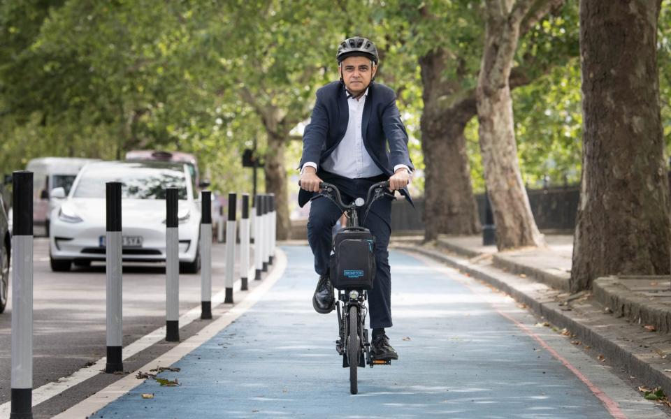 Mayor of London Sadiq Khan tries out a new Streetspace protected cycle lane in London - Stefan Rousseau/PA