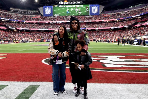 Blue Ivy Carter, Jay-Z and Rumi Carter attend the Super Bowl LVIII Pregame at Allegiant Stadium. - Credit: Kevin Mazur/Getty Images for Roc Nation