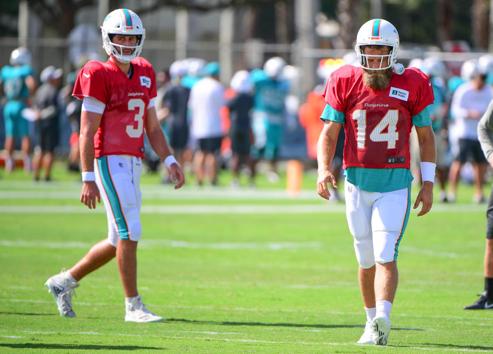 Miami Dolphins Josh Rosen, left, and Ryan Fitzpatrick represent about the only quarterback battle in the NFL this summer.