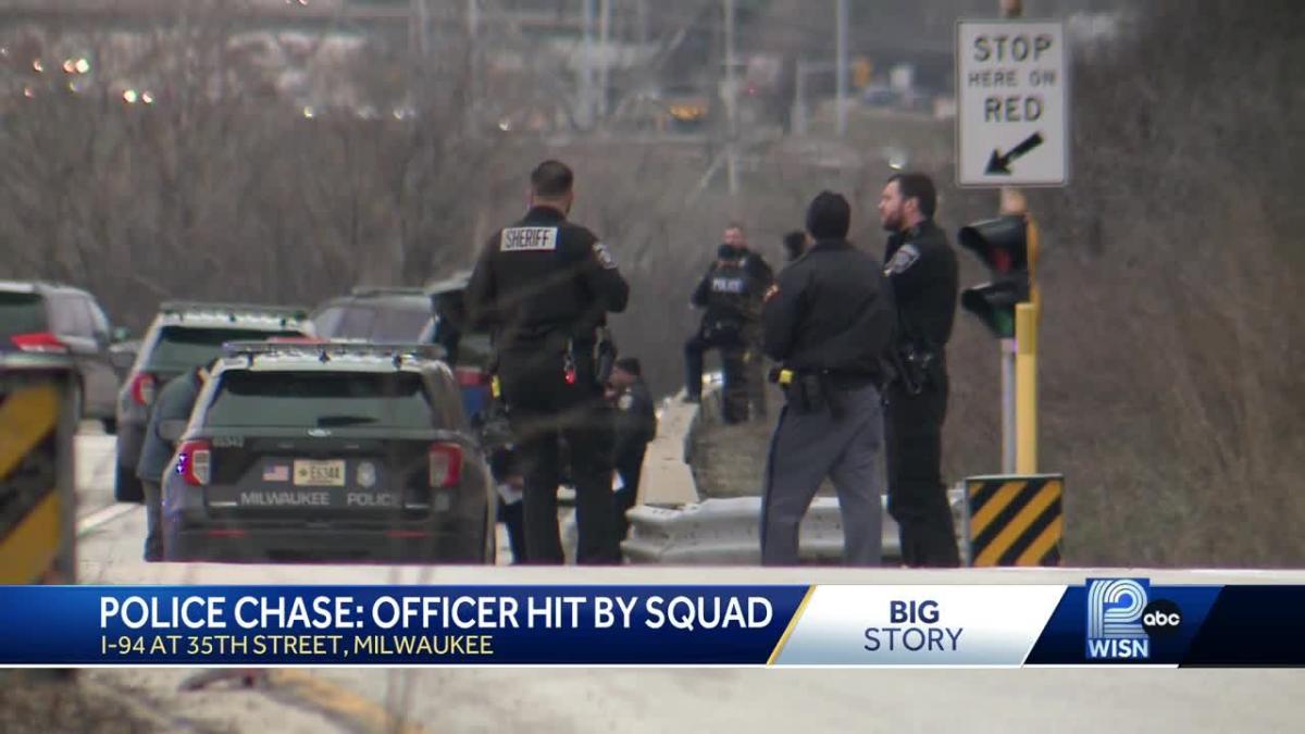 Milwaukee police officer struck by squad car during chase