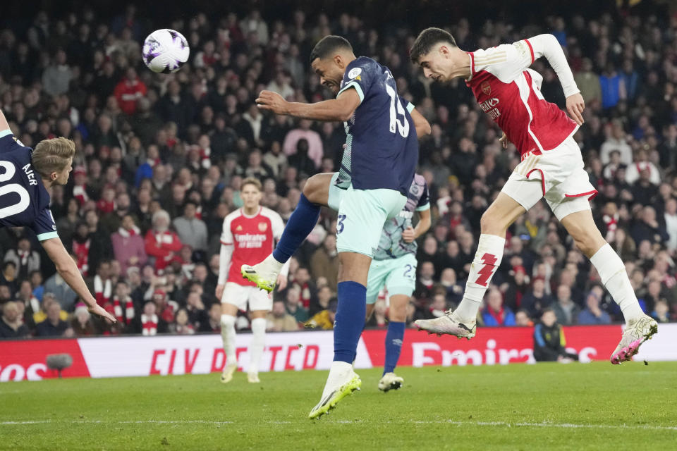 Arsenal's Kai Havertz, right, scores his side's second goal during the English Premier League soccer match between Arsenal and Brentford at the Emirates Stadium in London, England, Saturday, March 9, 2024. (AP Photo/Frank Augstein)