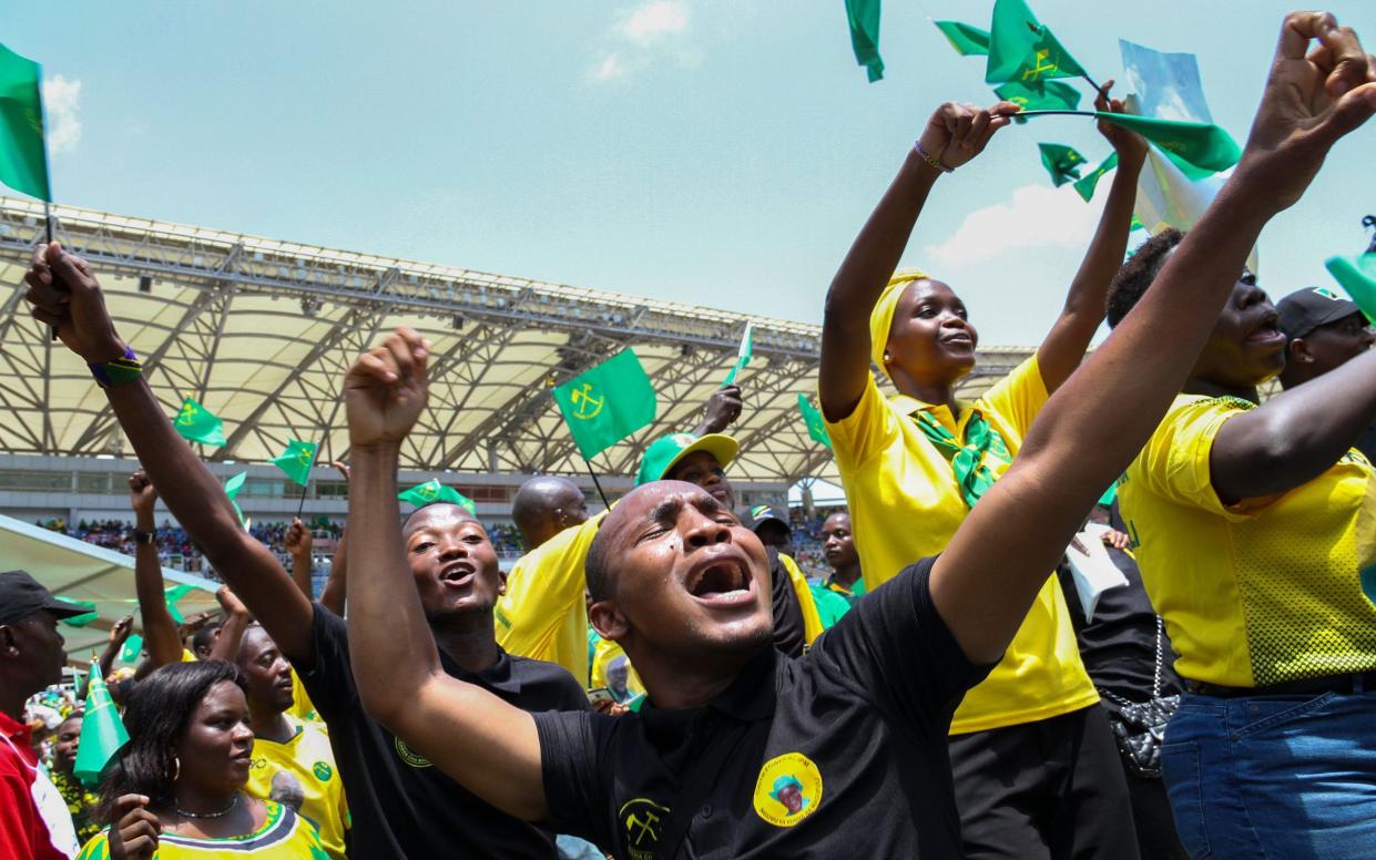 Supporters attend an election rally for Tanzania's ruling party Chama Cha Mapinduzi  - Shutterstock