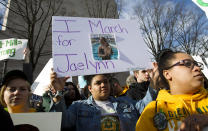 <p>A student from Great Mills High School in Maryland holds up the photograph of her classmate Jaelynn Willey at the March for Our Lives rally. Willey was killed in another school shooting. (AP Photo/Jose Luis Magana) </p>