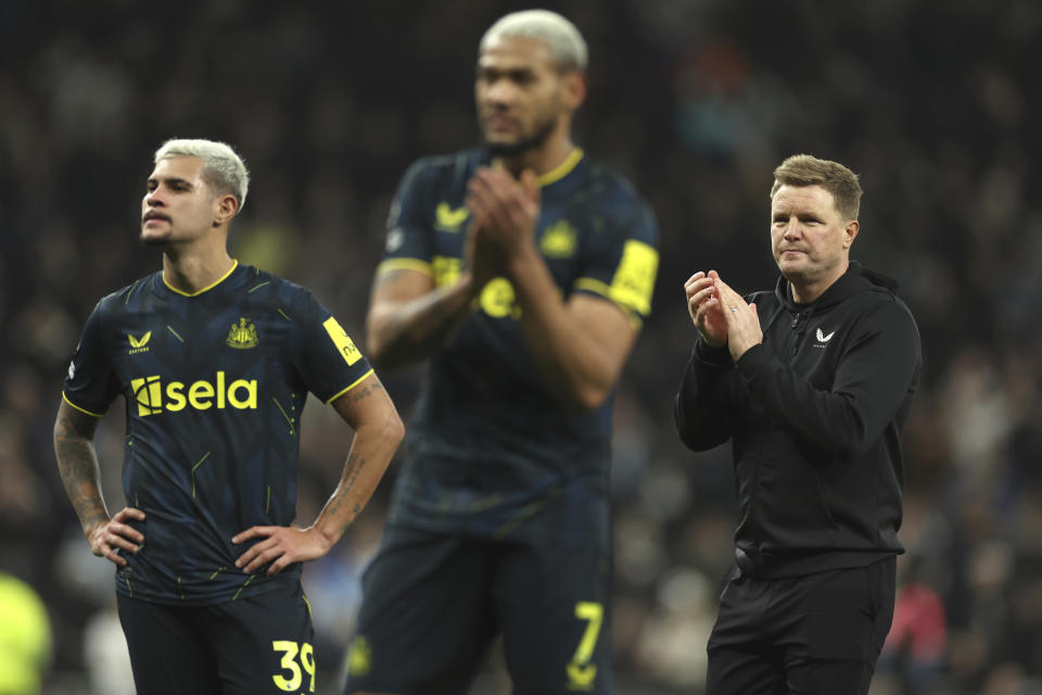 Newcastle's head coach Eddie Howe, right, Newcastle's Joelinton, centre, Newcastle's Bruno Guimaraes react to their loss at the end of the English Premier League soccer match between Tottenham Hotspur and Newcastle United, at the Tottenham Hotspur Stadium, London, England, Sunday, Dec.10, 2023. (AP Photo/Ian Walton)