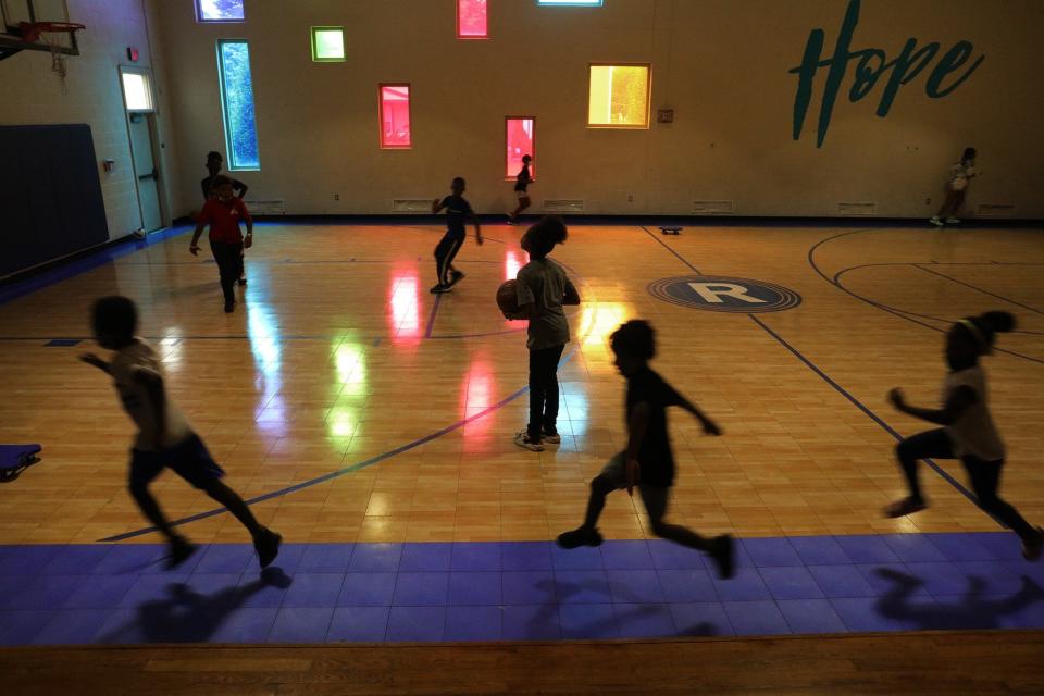 Children run around the perimeter of the basketball court at the Boys & Girl Club, where the Youth Suicide Prevention Program was implemented in 2019 and has since gone national. The program came at a time when concern is growing nationwide about the climbing rate of youth suicide, particularly among Black teens.