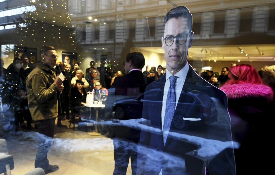 A cut-out of National Coalition Party (NCP) presidential candidate Alexander Stubb is seen in the window of a cafe as he campaigns in Helsinki, Finland, Thursday, Jan. 11, 2024. The first round of the Finnish presidential election will take place on January 28. (Vesa Moilanen/Lehtikuva via AP)